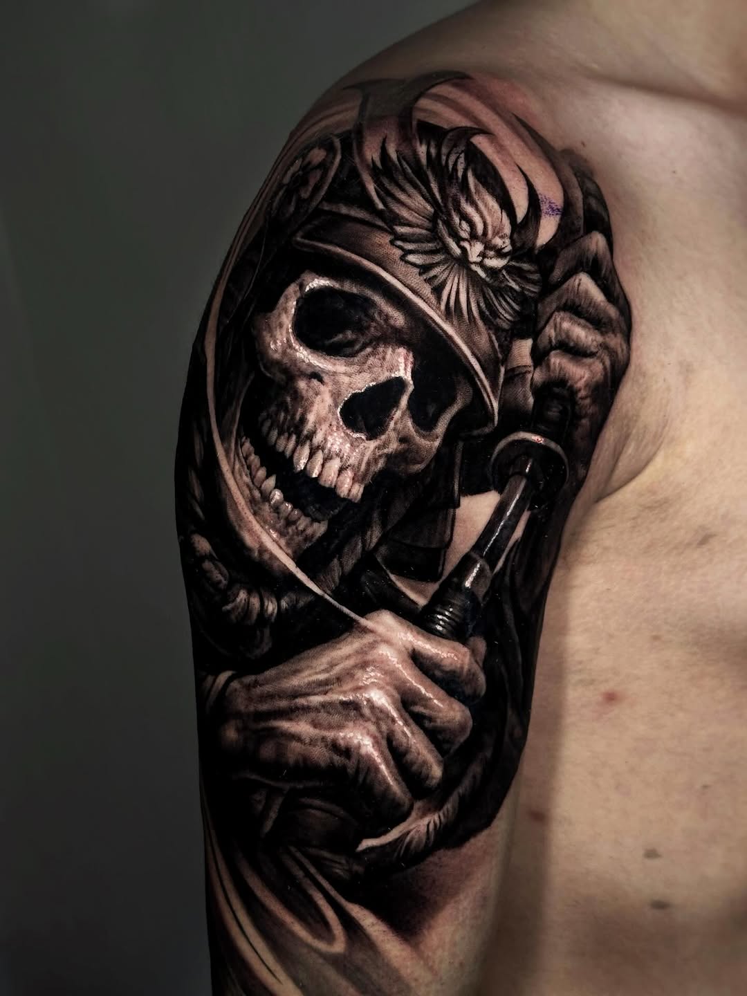 Skeletal figure wearing a hooded cloak and holding a revolver on upper arm, rendered in black and grey with smooth shading.