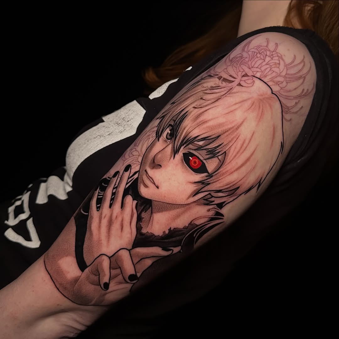 Anime-style character portrait with pink hair and glowing red eyes on upper arm, rendered in black and grey shading.